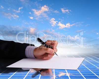 Businessman hand signing documents