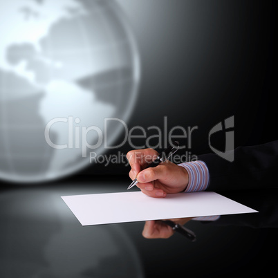 Businessman hand signing documents