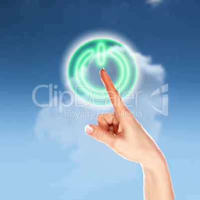 Power button against sky background