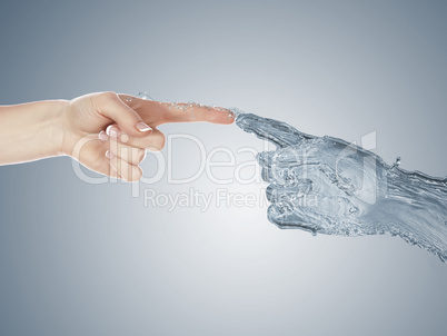 Two human hands touching each other