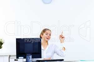 Young woman generating ideas in office