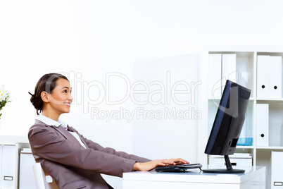 Young woman in business wear working in office