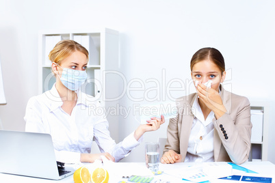 People with cold and flu  at work place