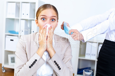 People with cold and flu  at work place