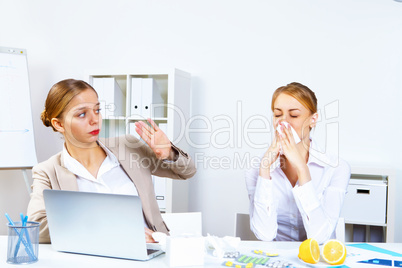 People with cold and flu  at work place