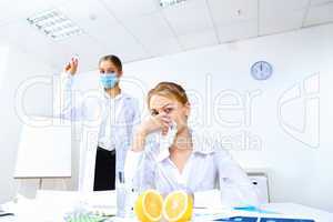 Nurse with syringe doing vaccination in office