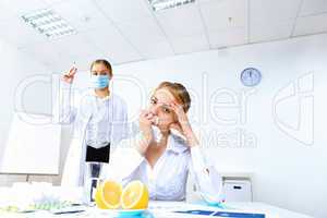 Nurse with syringe doing vaccination in office