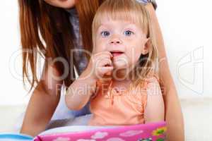 Young mother with little daughter