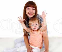 Young mother with little daughter