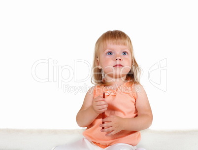 Little blond girl in studio