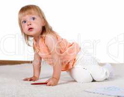 Little blond girl in studio