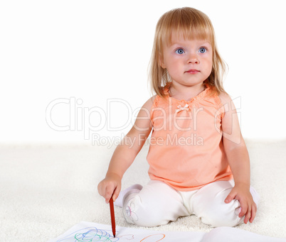 Little blond girl in studio