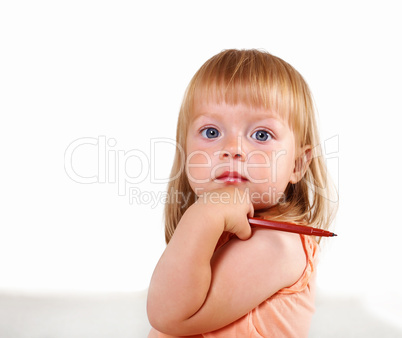 Little blond girl in studio