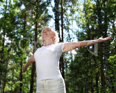 Elderly woman playing sports