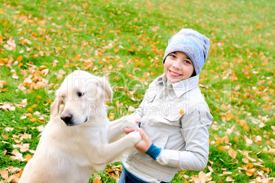 Boy playing in autumn park