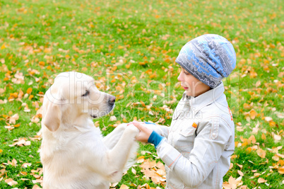 Boy playing in autumn park