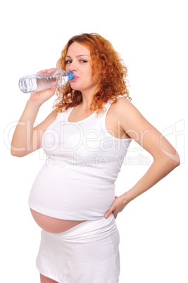 Young red-haired pregnant girl