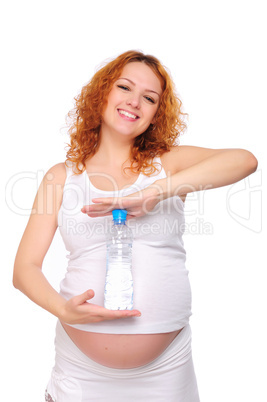 Young red-haired pregnant girl