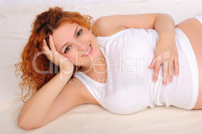 Charming red-haired young woman