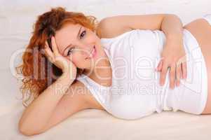 Charming red-haired young woman