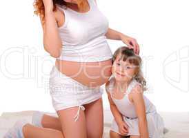 Young redhead pregnant mother