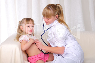 doctor listens to a stethoscope