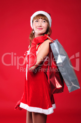 young girl dressed as Santa Claus