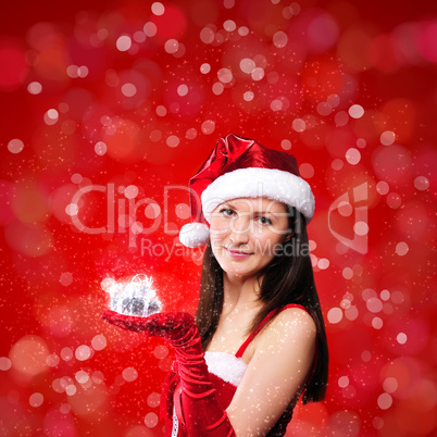 Portrait of a young girl dressed as Santa Claus