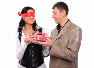 young man gives his girlfriend a gift
