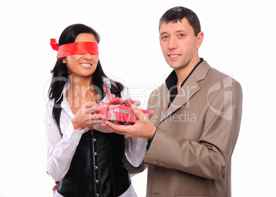 young man gives his girlfriend a gift