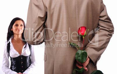 young man gives his girlfriend a rose