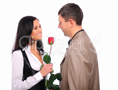 young man gives his girlfriend a rose