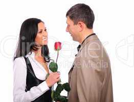 young man gives his girlfriend a rose