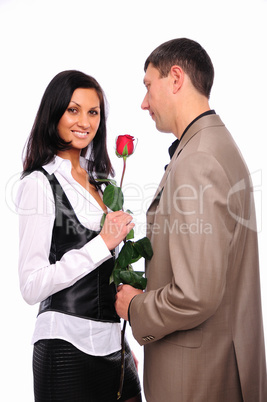 young man gives his girlfriend a rose