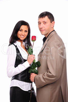 young man gives his girlfriend a rose