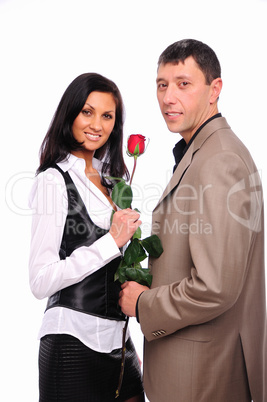 young man gives his girlfriend a rose