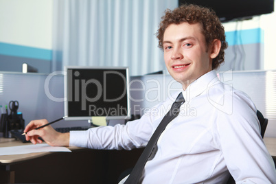 a young businessman in office