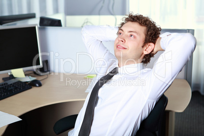 a young businessman in office