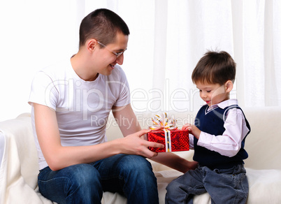 Dad gives his son a gift