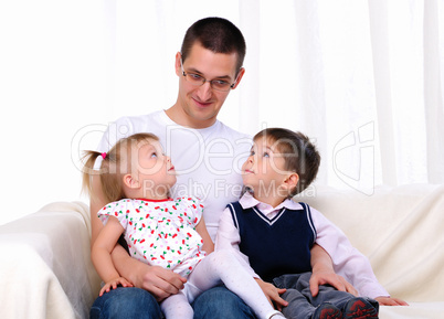 young father with his daughter and son