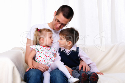 young father with his daughter and son