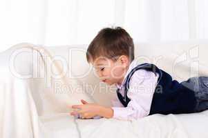 Little boy playing video games