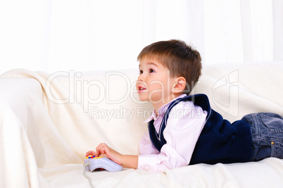 Little boy playing video games