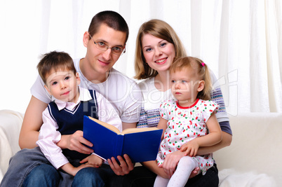 Mom, daughter, son and dad