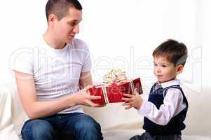 Dad gives his son a gift