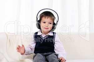 little boy enjoys the music