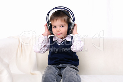 little boy enjoys the music