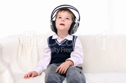 little boy enjoys the music