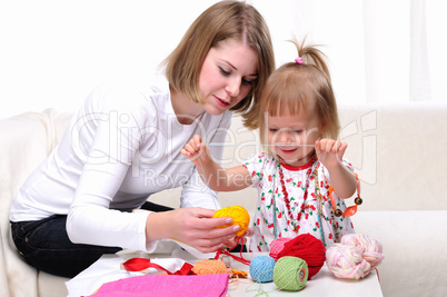 Young mother and her baby daughter