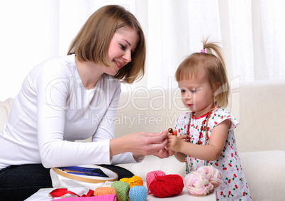 Young mother and her baby daughter